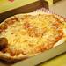A pizza is sliced up at Huron High School on Friday. Daniel Brenner I AnnArbor.com